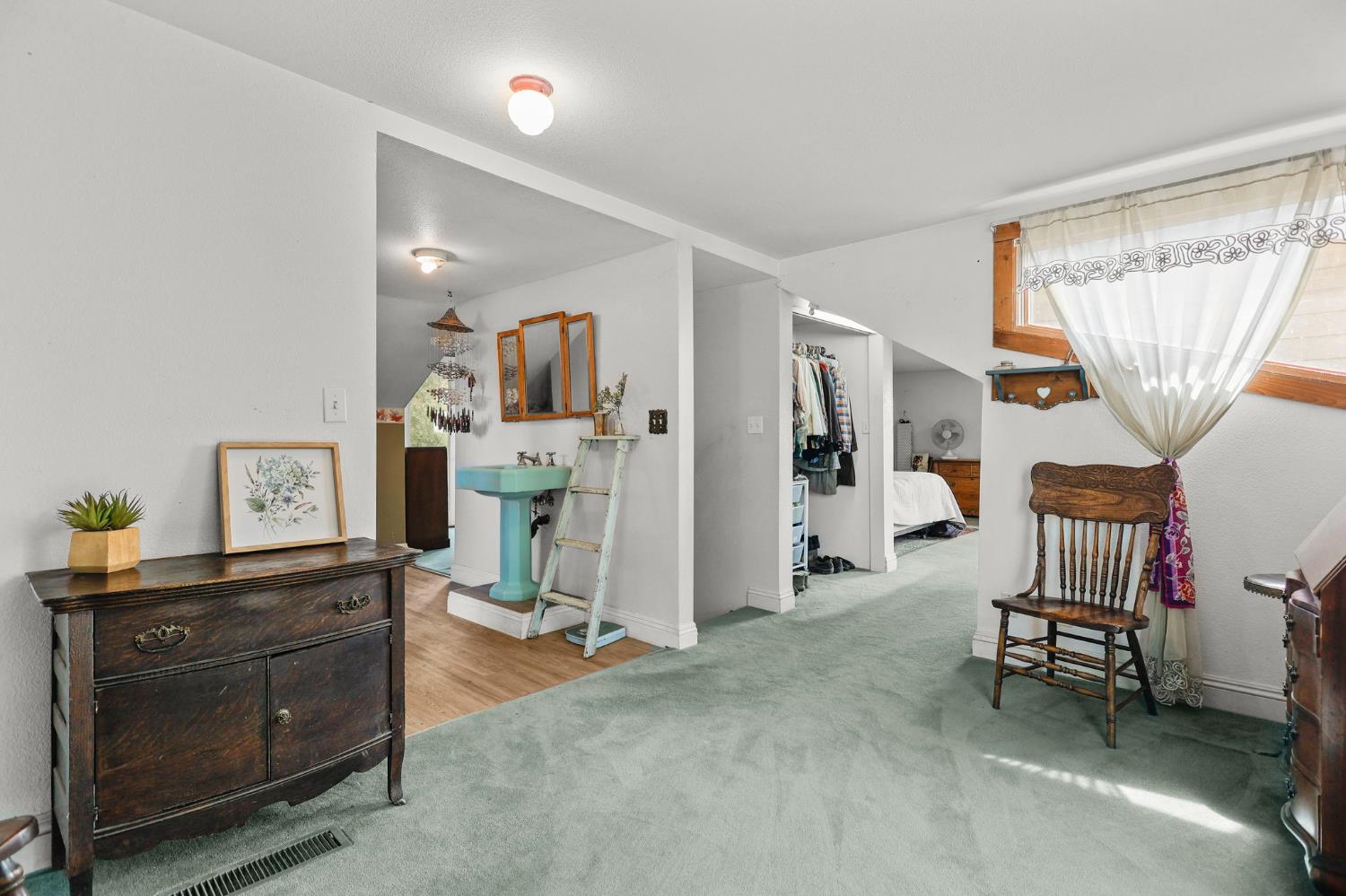 18525 Emerson Road Red Bluff, CA 96080 - Photo 39 of 92 a view of a workspace with furniture and toys