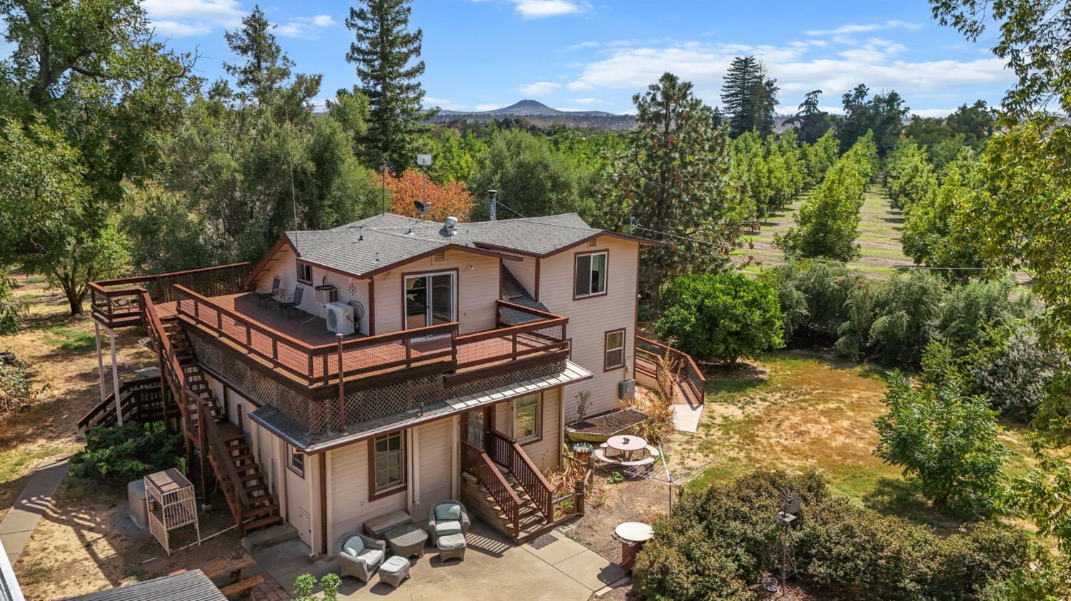 18525 Emerson Road Red Bluff, CA 96080 - Photo 7 of 92 a view of a house with a trees