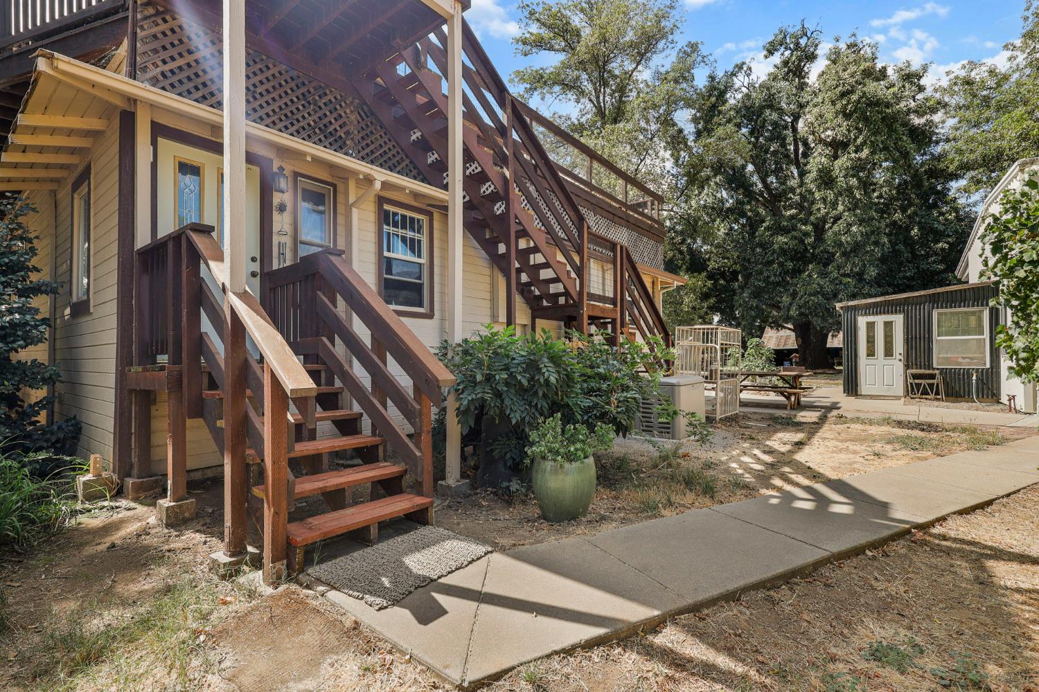 18525 Emerson Road Red Bluff, CA 96080 - Photo 80 of 92 a view of a house with backyard and sitting area