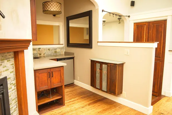 a kitchen with a sink and a stove