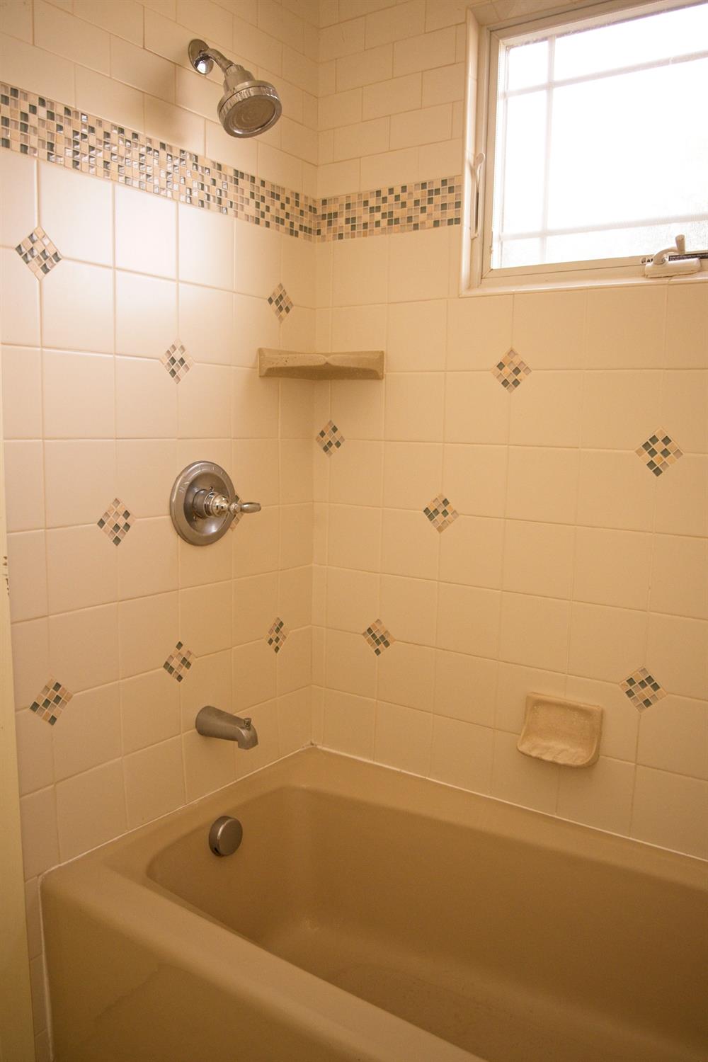 126 Center Street Jackson, CA 95642 - Photo 23 of 95 Main/street level custom tiled shower surround with tub
