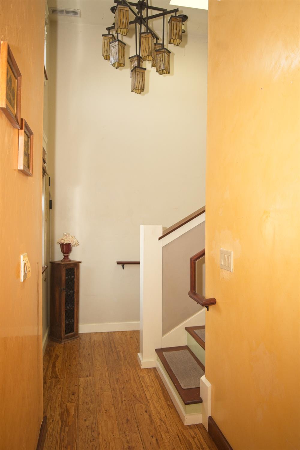 126 Center Street Jackson, CA 95642 - Photo 24 of 95 Stairs up to main level from hallway off dining, kitchen and family room