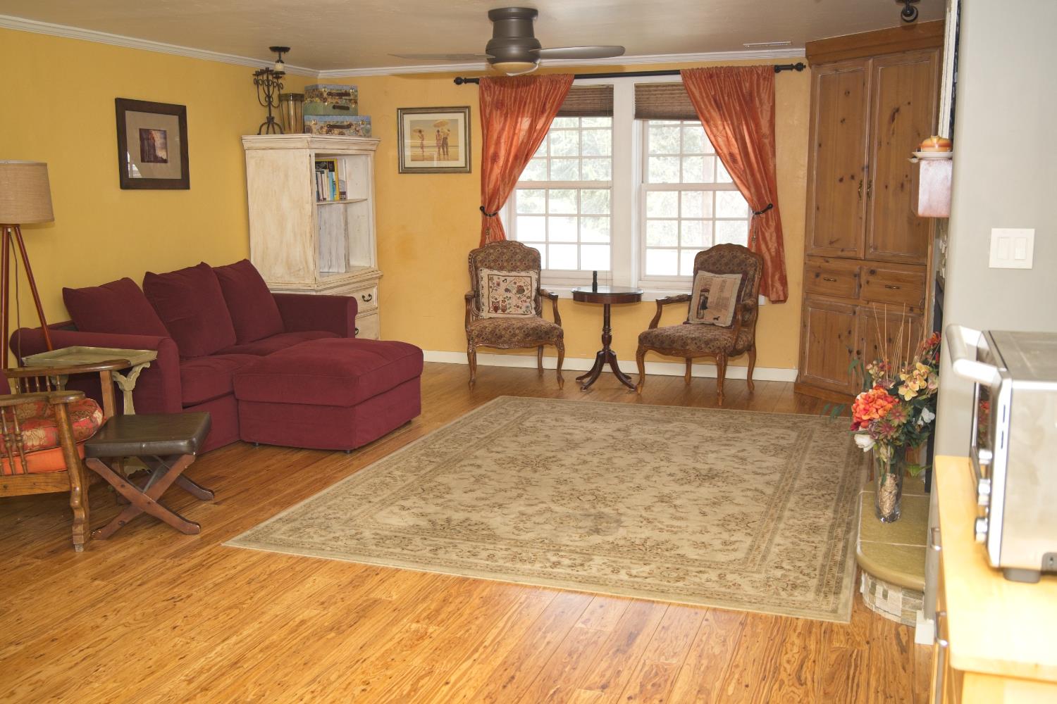 126 Center Street Jackson, CA 95642 - Photo 37 of 95 Family room with built in cabinetry, gas fireplace with stone/tile just off kitchen.