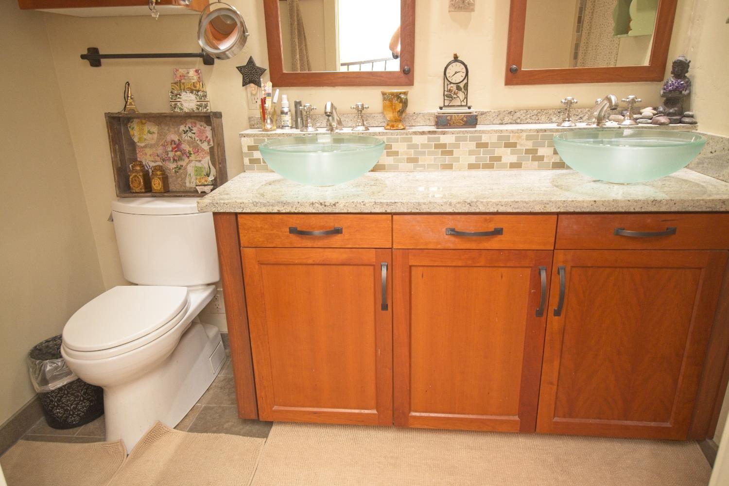 126 Center Street Jackson, CA 95642 - Photo 49 of 95 Custom vanity with backsplash shelf, double sinks, large medicine cabinets and walk in custom tiled shower