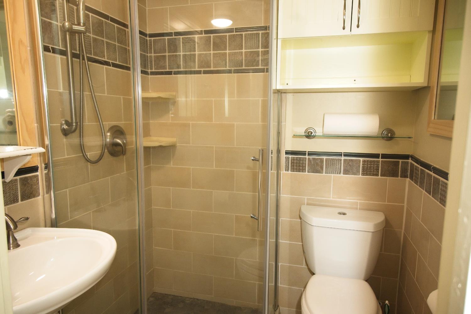 126 Center Street Jackson, CA 95642 - Photo 61 of 95 Hall bath with custom corner tiled shower, floors and walls