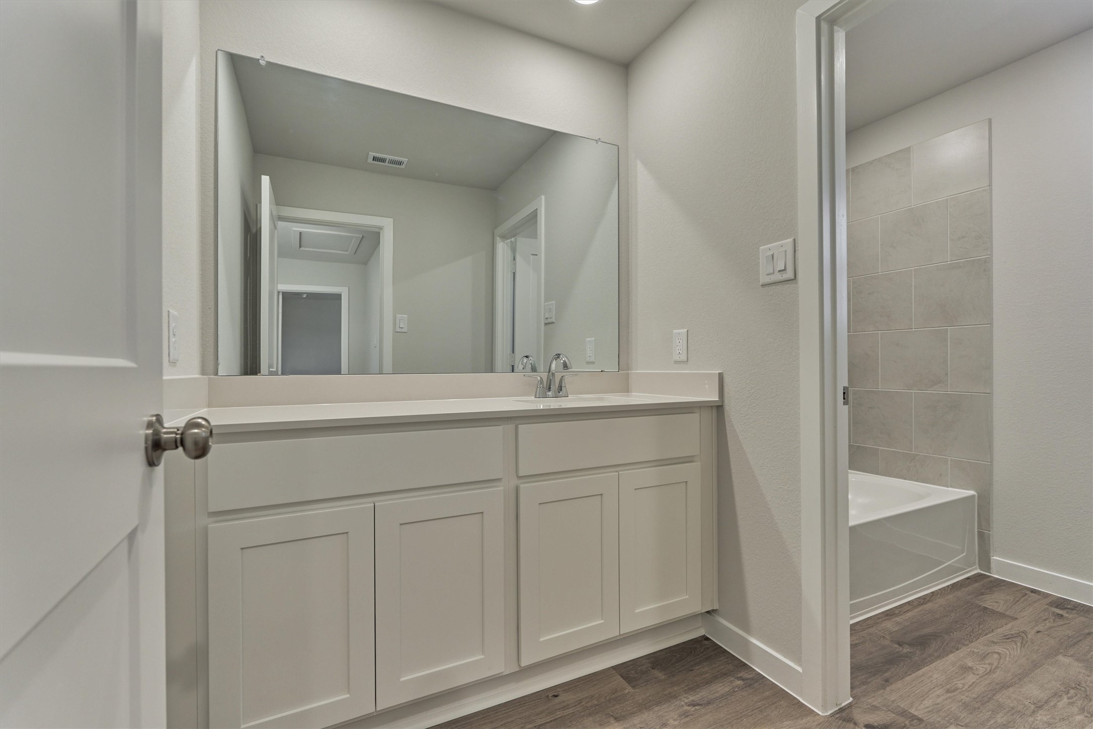 294 Brazen Forest Trail Magnolia, TX 77354 - Photo 25 of 37 a bathroom with a sink and a mirror