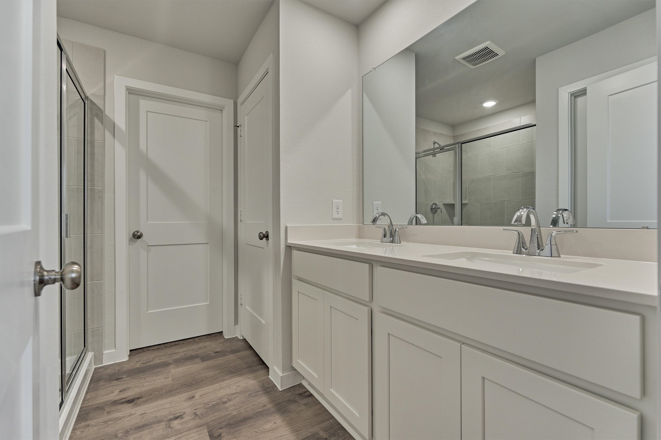 294 Brazen Forest Trail Magnolia, TX 77354 - Photo 30 of 37 a bathroom with a double vanity sink and mirror