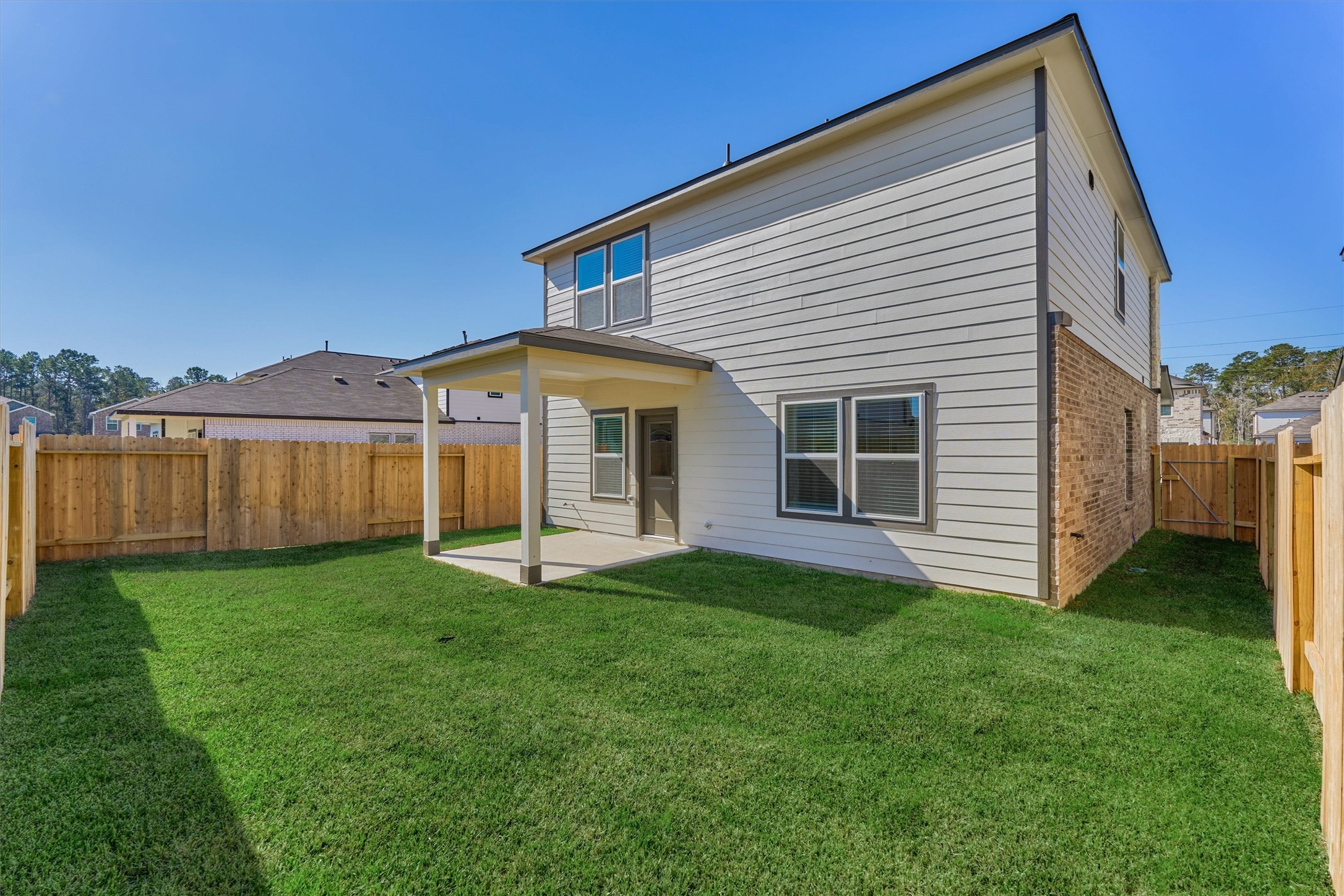 294 Brazen Forest Trail Magnolia, TX 77354 - Photo 34 of 37 a view of a house with a yard and deck