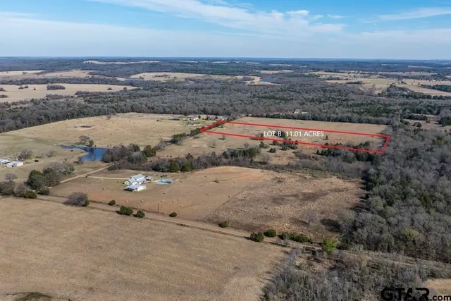 an aerial view of beach and city
