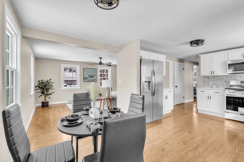 9 Edwill Road East Longmeadow, MA 01028 - Photo 14 of 34 a living room with furniture and a kitchen