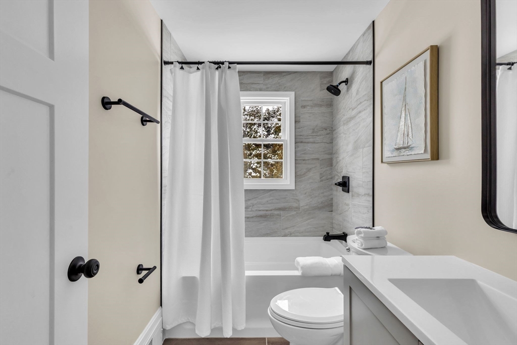 9 Edwill Road East Longmeadow, MA 01028 - Photo 17 of 34 a bathroom with a sink toilet and shower