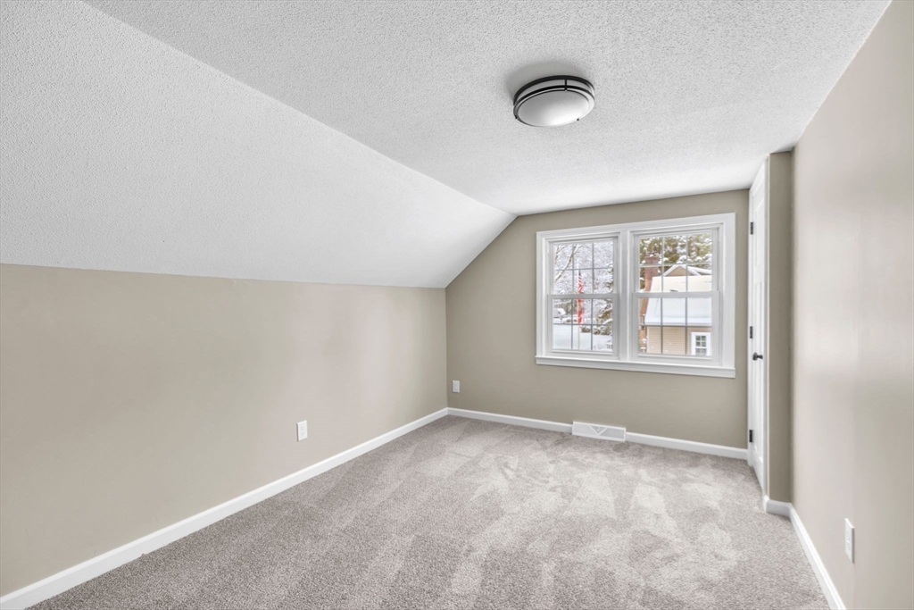 9 Edwill Road East Longmeadow, MA 01028 - Photo 24 of 34 an empty room with windows and closet