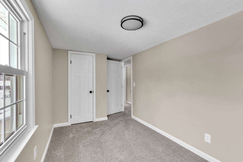 9 Edwill Road East Longmeadow, MA 01028 - Photo 26 of 34 a view of a room with rack on the wall