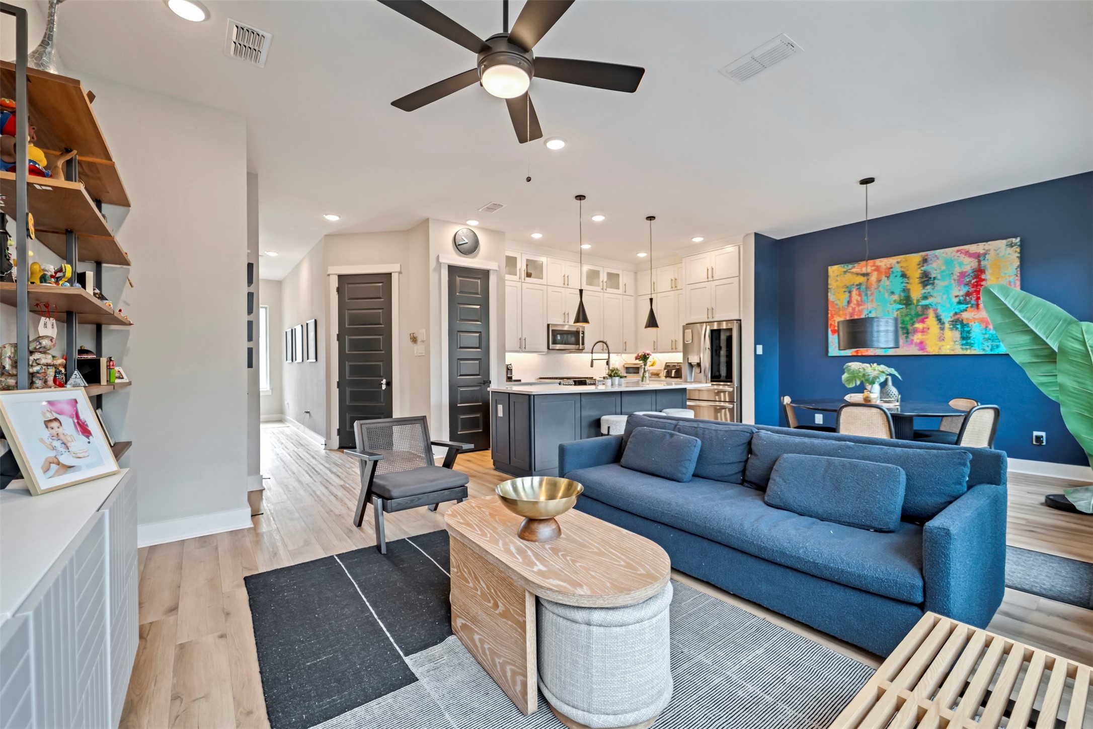 5209 Carters Bank Avenue Houston, TX 77091 - Photo 1 of 24 a living room with furniture and a flat screen tv