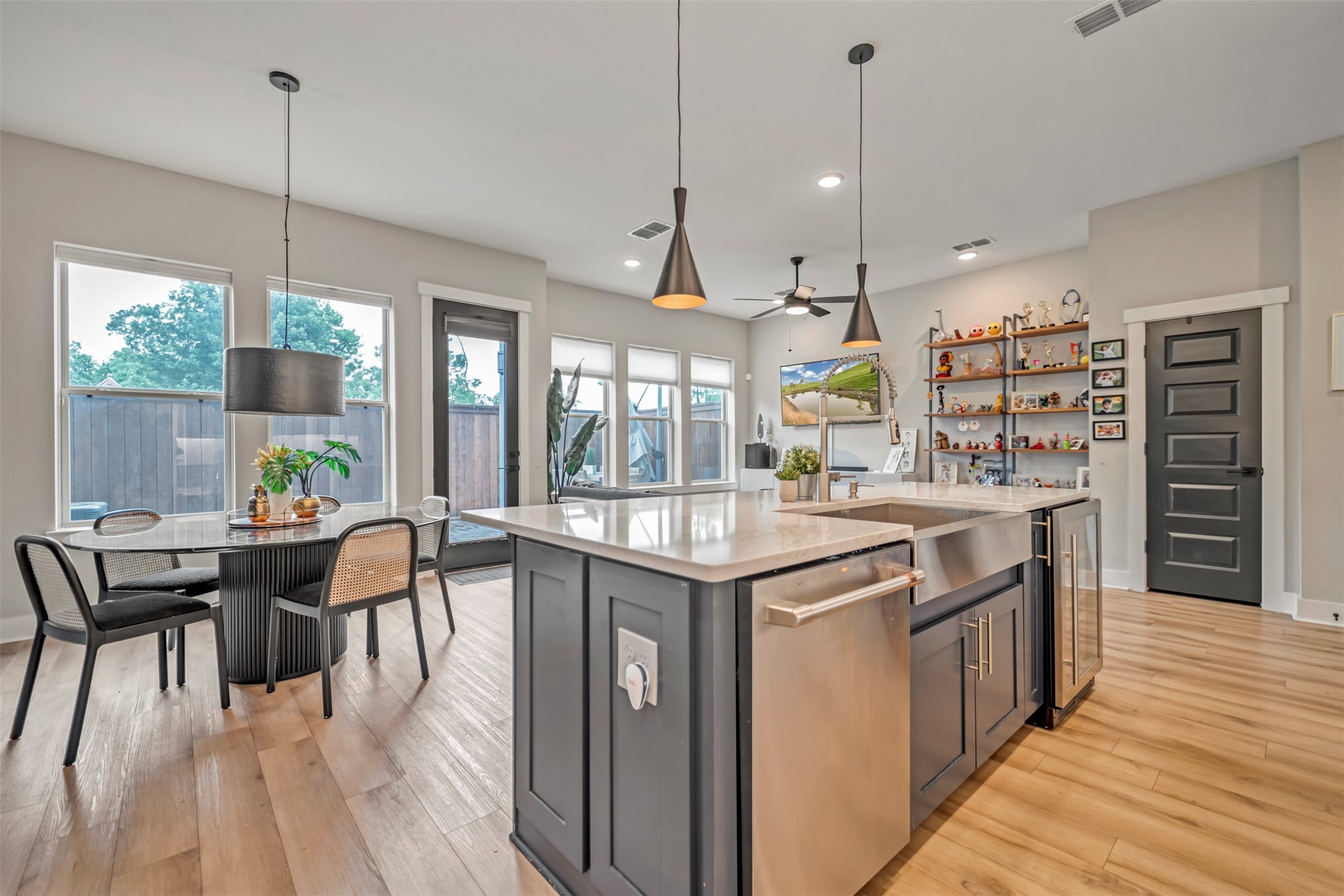 5209 Carters Bank Avenue Houston, TX 77091 - Photo 11 of 24 a kitchen with stainless steel appliances granite countertop a stove and a wooden floors