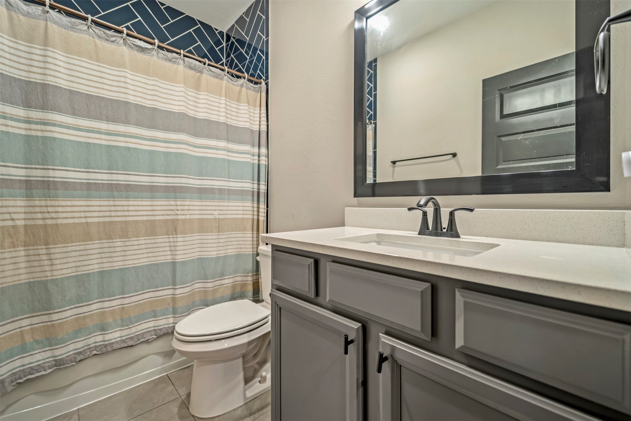 5209 Carters Bank Avenue Houston, TX 77091 - Photo 20 of 24 a bathroom with a sink a toilet and shower