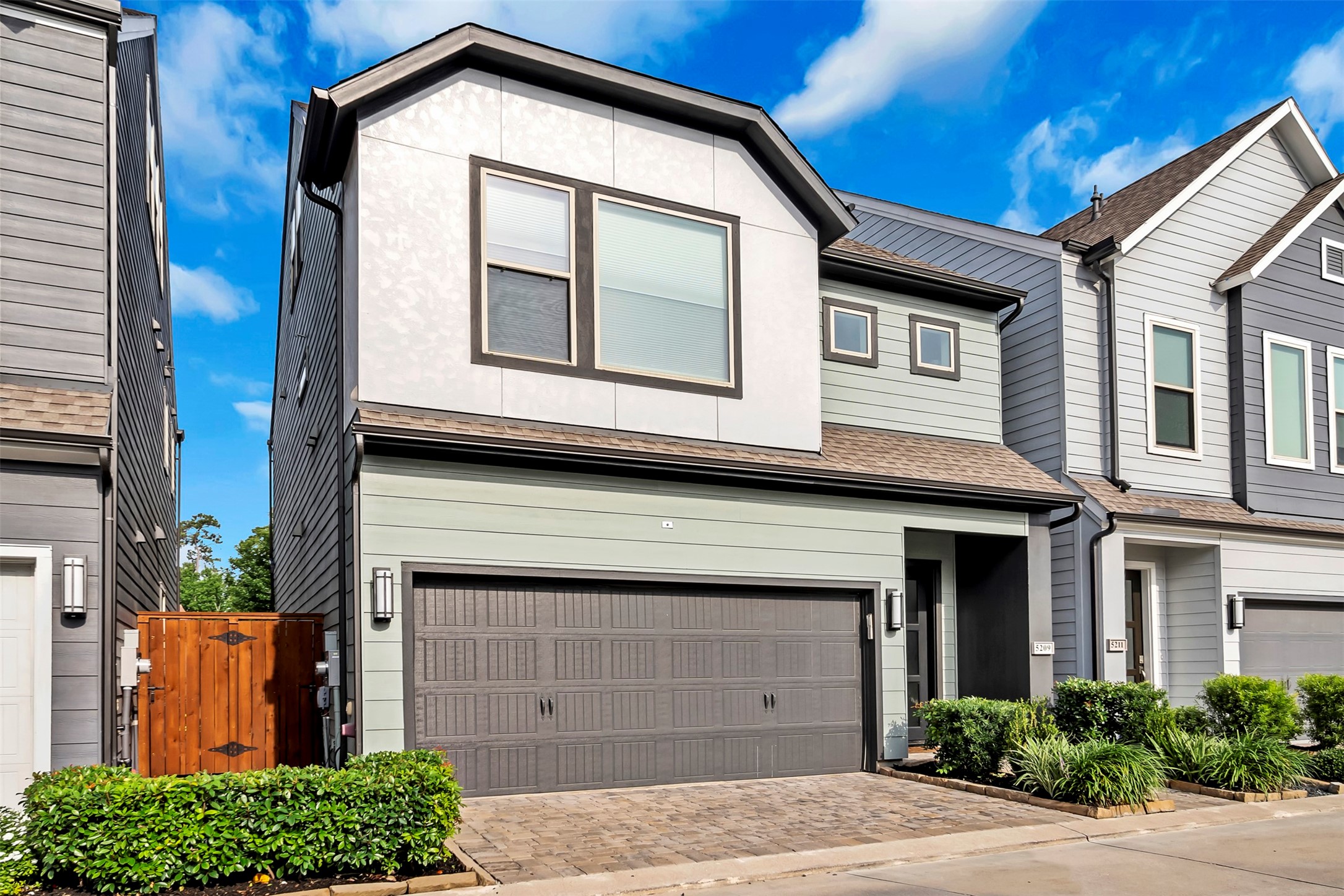 5209 Carters Bank Avenue Houston, TX 77091 - Photo 24 of 24 a front view of a house with a garage