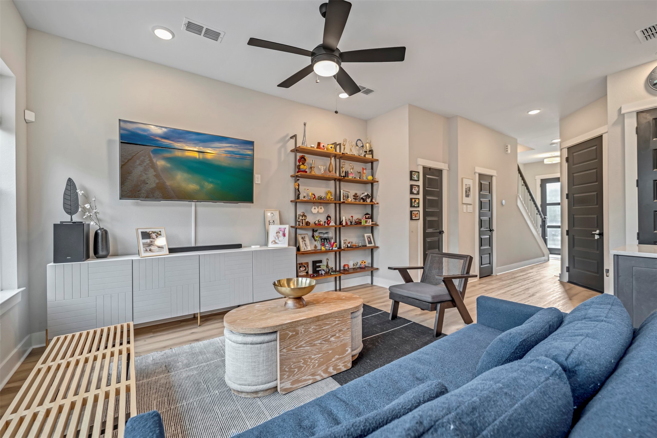 5209 Carters Bank Avenue Houston, TX 77091 - Photo 8 of 24 a living room with furniture and a flat screen tv