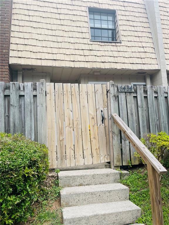 a view of entryway with wooden stairs