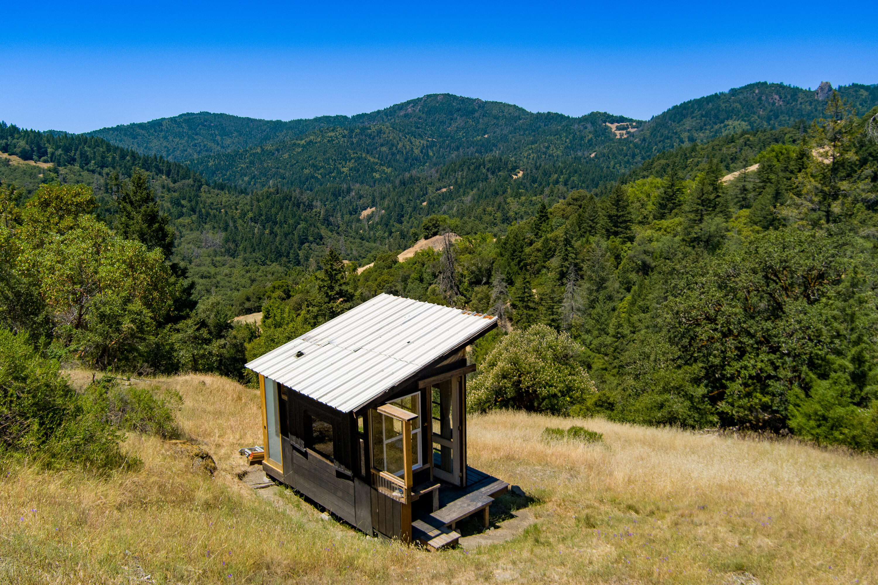 60890 Bell Springs Road Laytonville, CA 95454 - Photo 60 of 77 a view of a terrace with a table and chairs