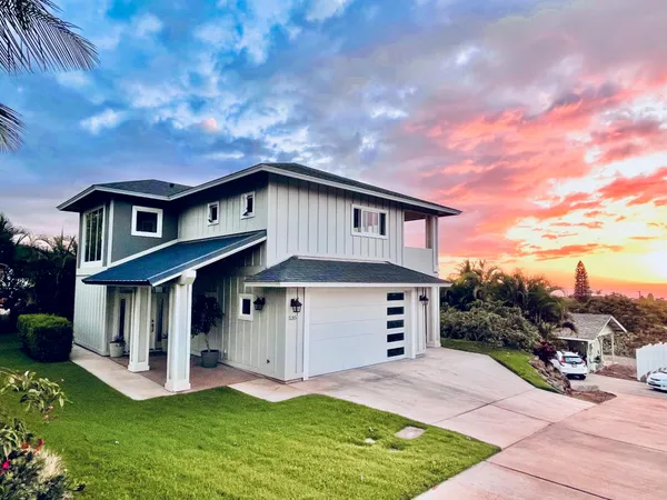 a view of house with yard and entertaining space