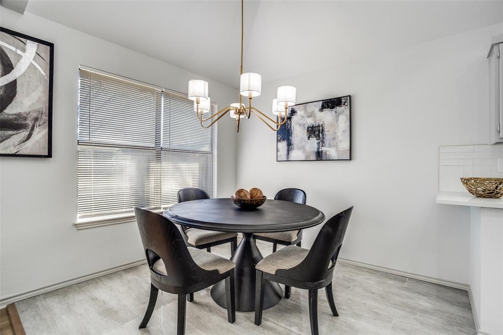 509 Rose Drive Allen, TX 75002 - Photo 14 of 25 a dining room with furniture and window