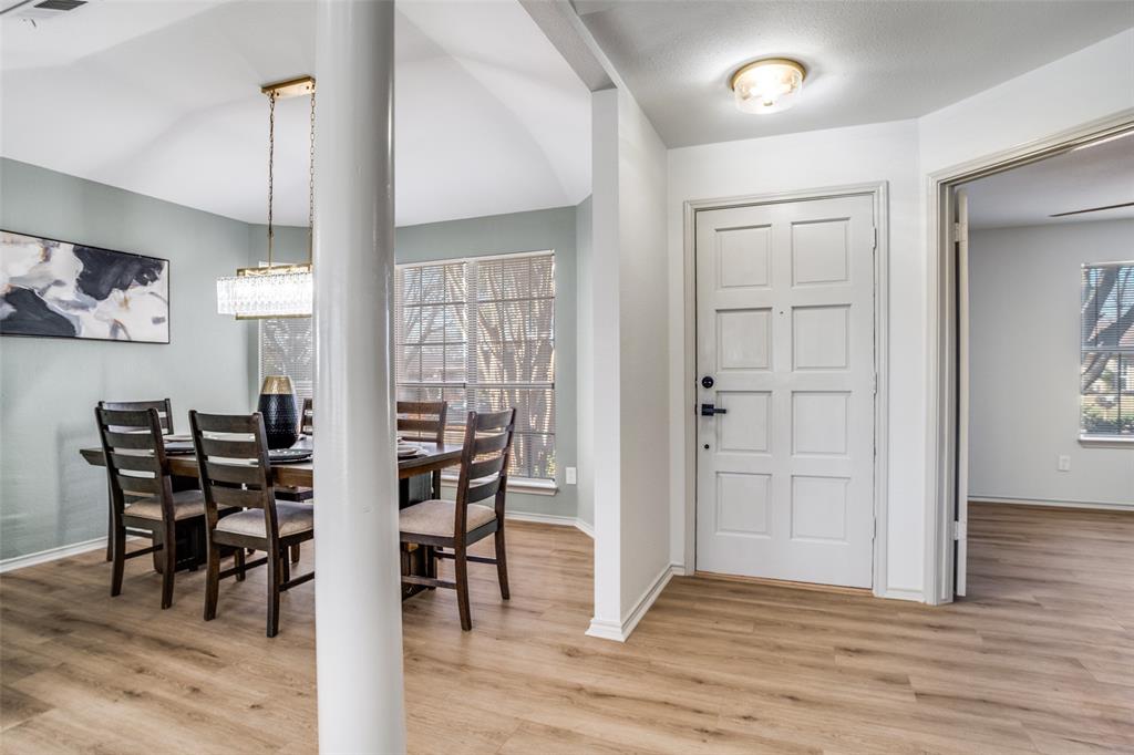 509 Rose Drive Allen, TX 75002 - Photo 4 of 25 an empty room with wooden floor and windows