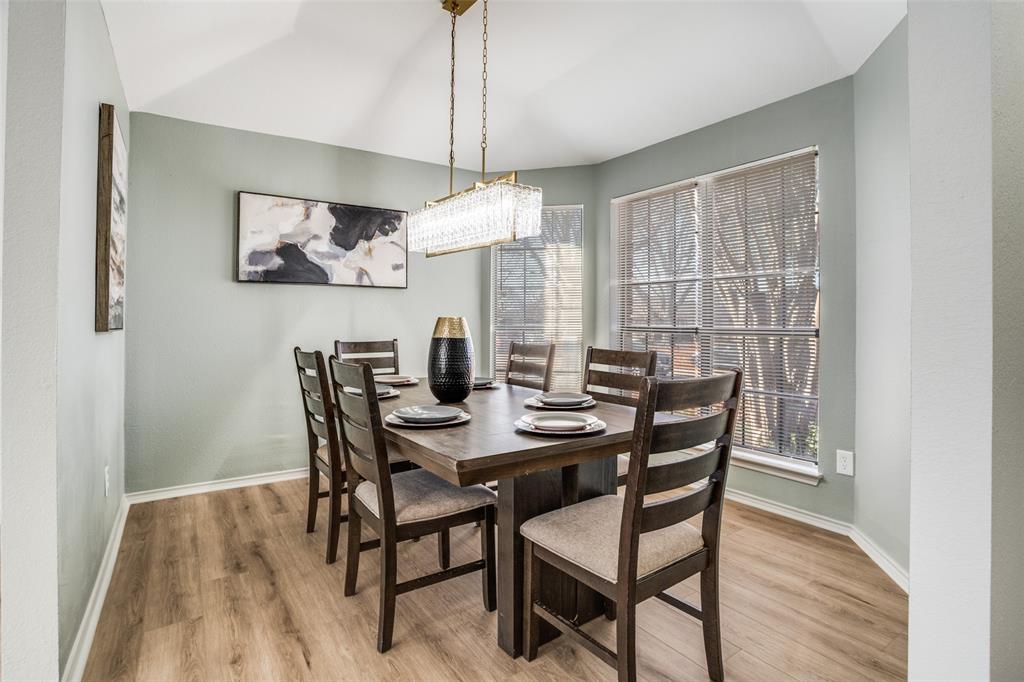 509 Rose Drive Allen, TX 75002 - Photo 5 of 25 a view of a dining room with furniture window and wooden floor