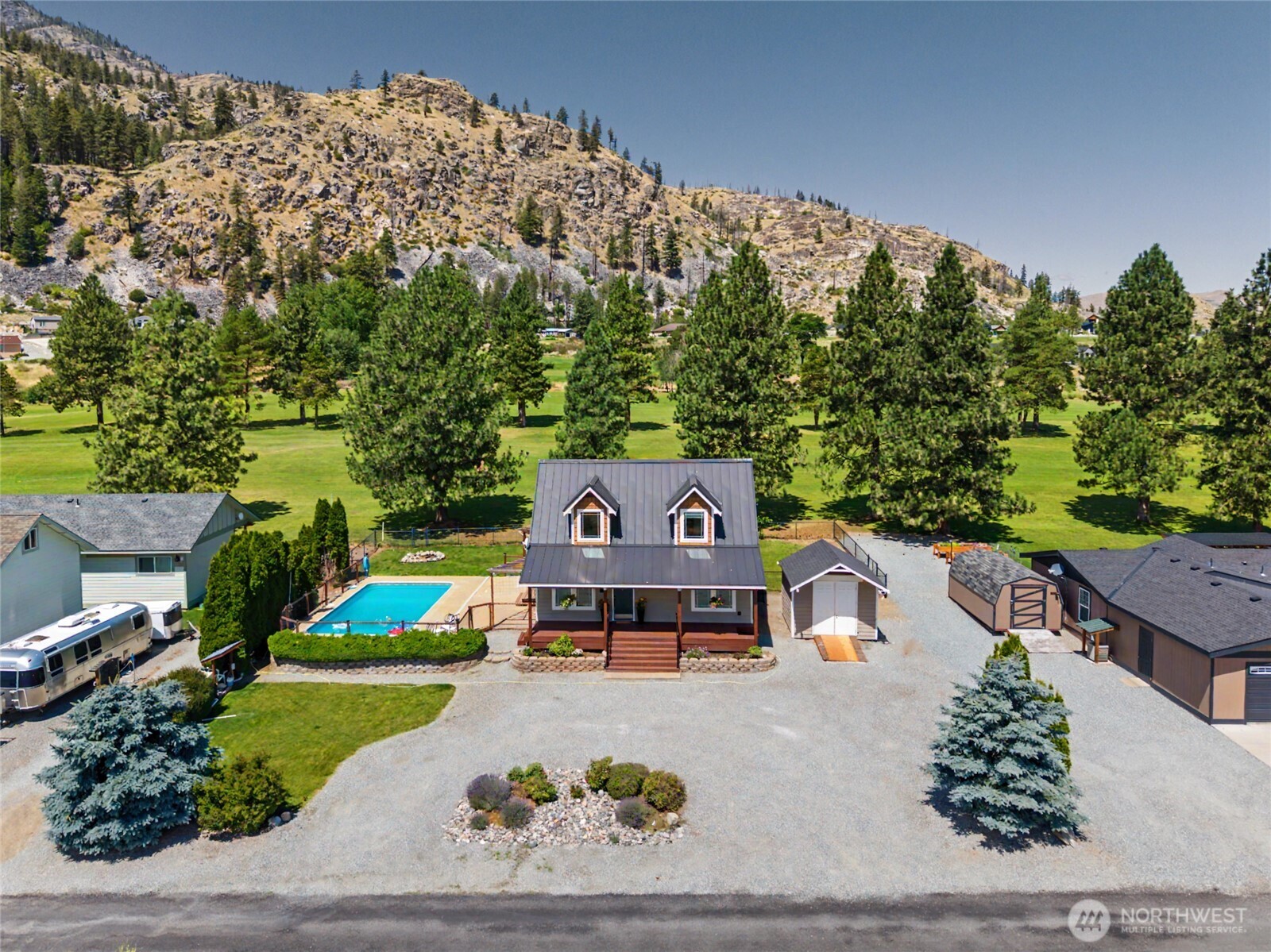93 Golf Course Drive Pateros, WA 98846 - Photo 31 of 34 an aerial view of a house with a garden