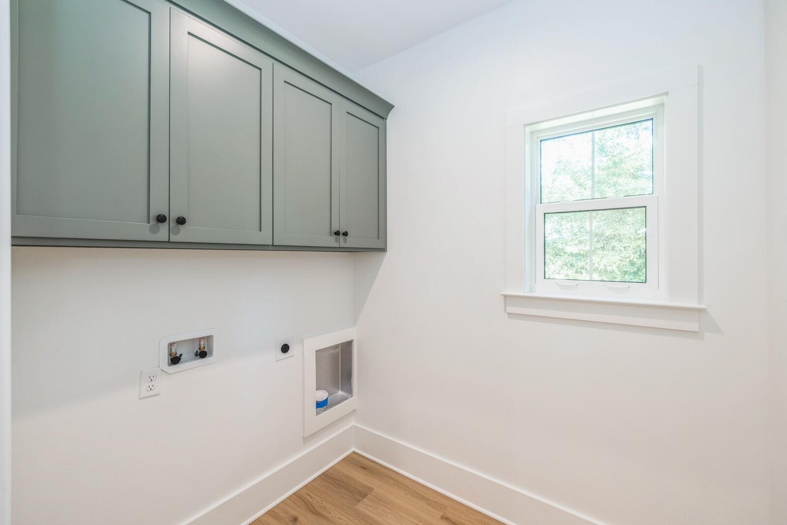 521 Brock Avenue Crestview, FL 32539 - Photo 14 of 16 a view of small space with wooden floor