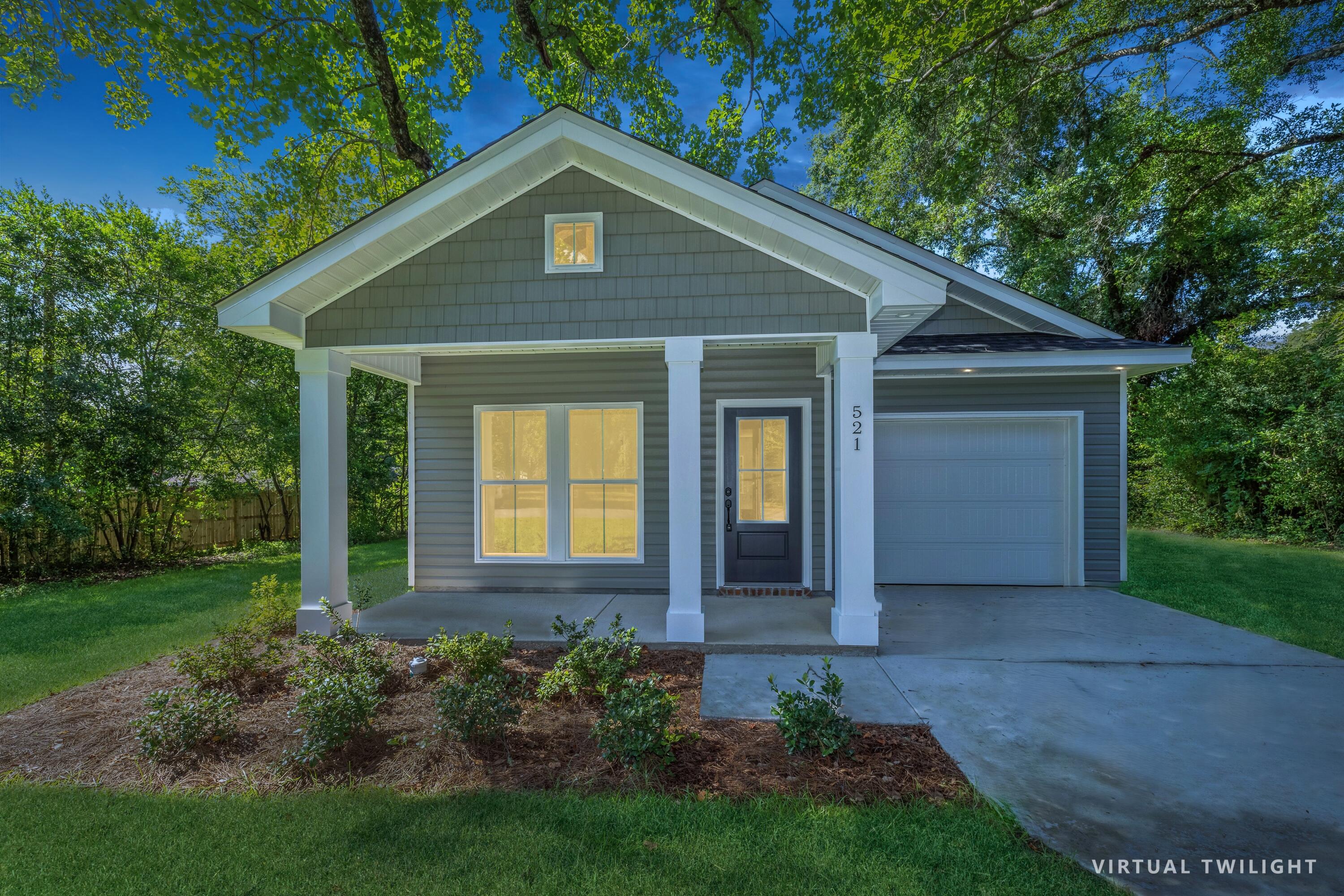 521 Brock Avenue Crestview, FL 32539 - Photo 16 of 16 a front view of house with a garden