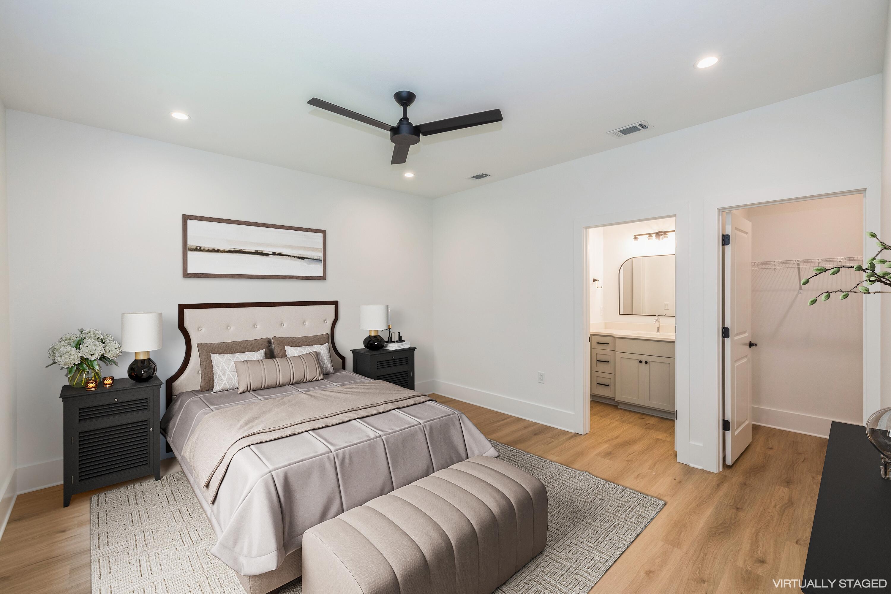 521 Brock Avenue Crestview, FL 32539 - Photo 7 of 16 a bedroom with a bed and a walk in closet