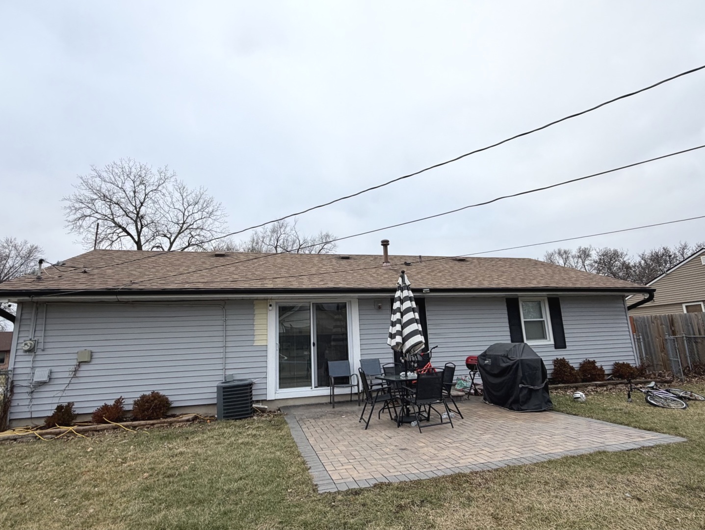 709 Hudson Avenue Romeoville, IL 60446 - Photo 3 of 16 a view of a house with a patio and a yard
