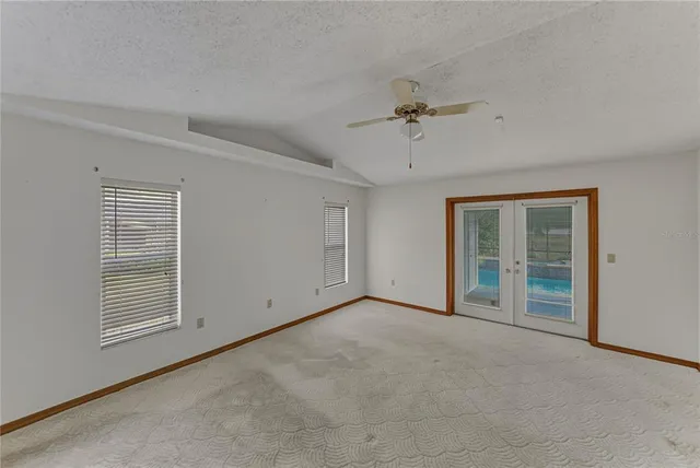 a bathroom with a sink a mirror and a shower