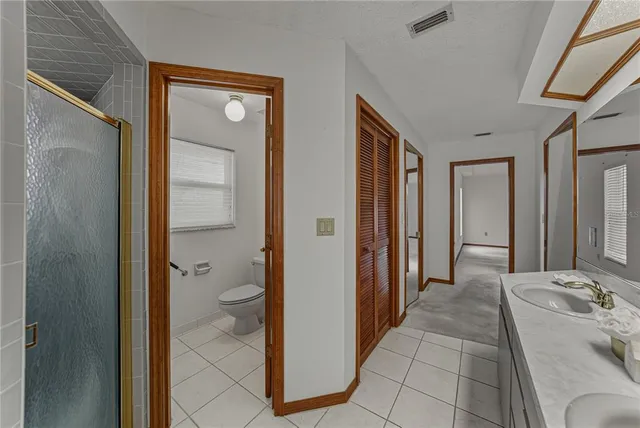 a view of a kitchen with microwave and stove