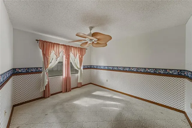 a view of an empty room with garage