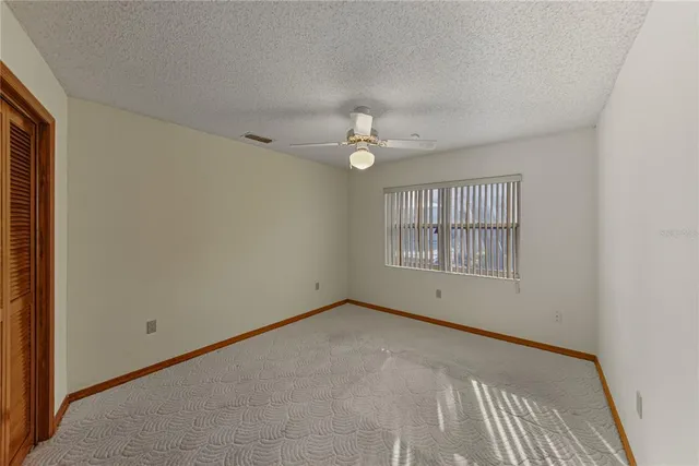 a view of a living room and workspace