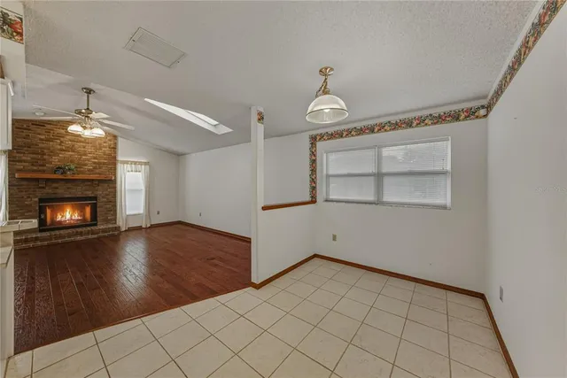 a view of a backyard with sitting area