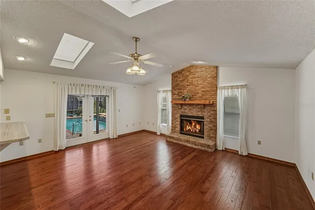 a view of a house with backyard