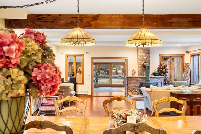 a living room with a chandelier furniture and a chandelier