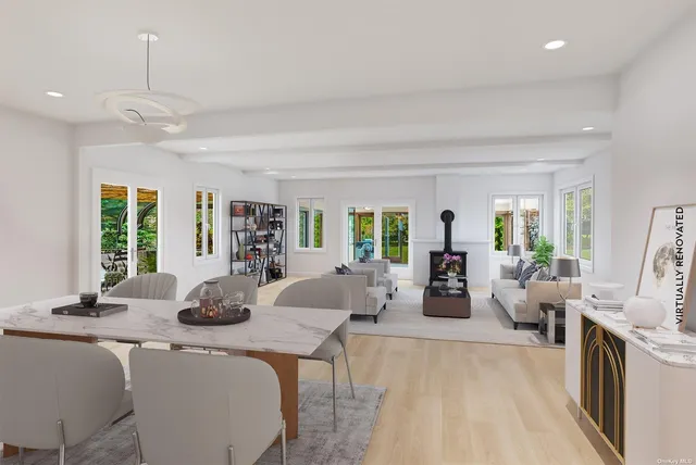 a view of a dining room with furniture window and outside view