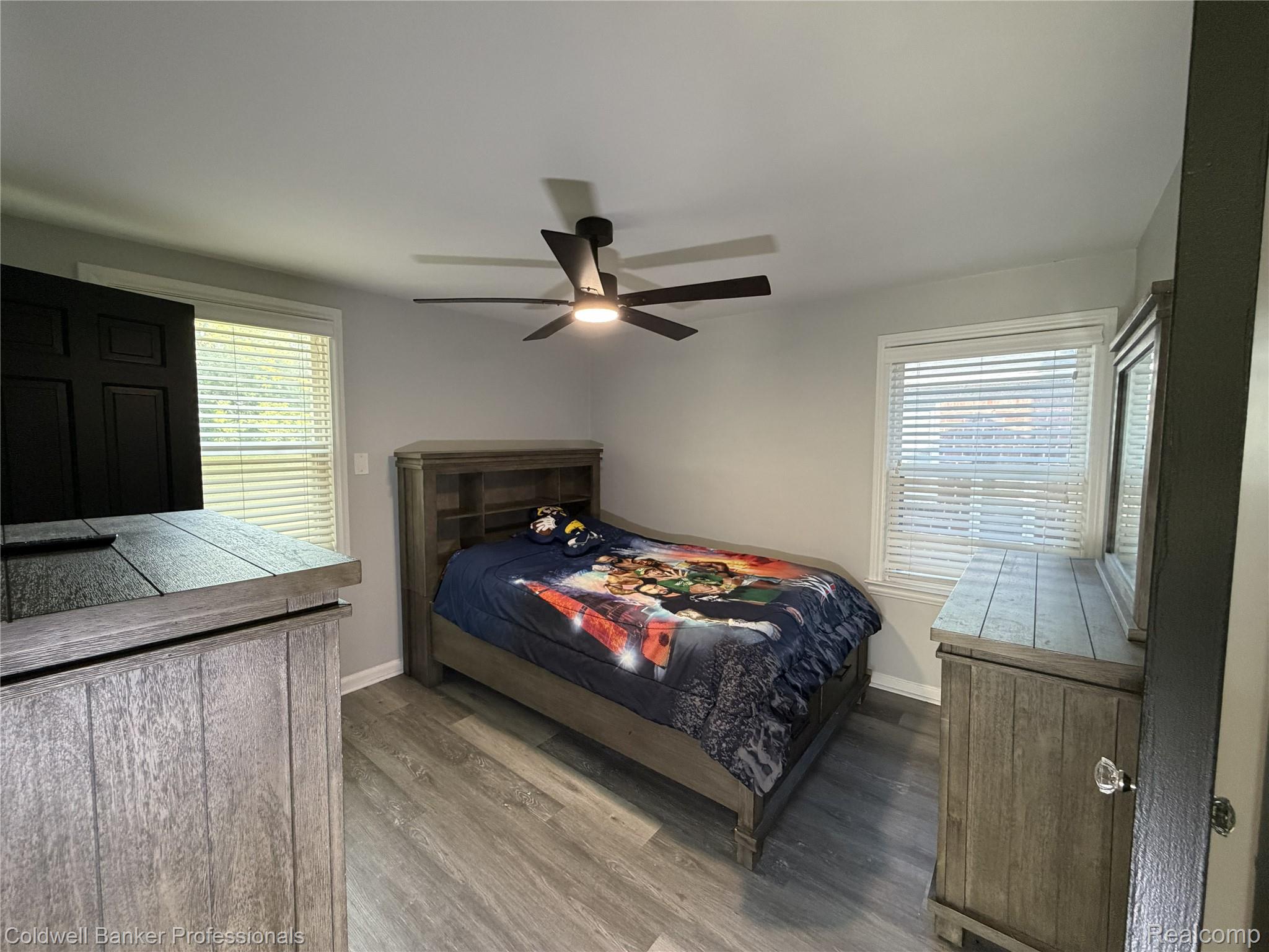 1168 Vernier Road Grosse Pointe, MI 48236 - Photo 37 of 37 Room with gray walls and wood-finish flooring