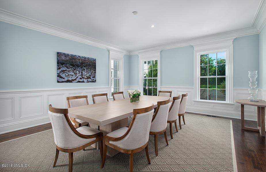 272 Round Hill Road Greenwich, CT 06831 - Photo 11 of 33 a view of a dining room with furniture and wooden floor