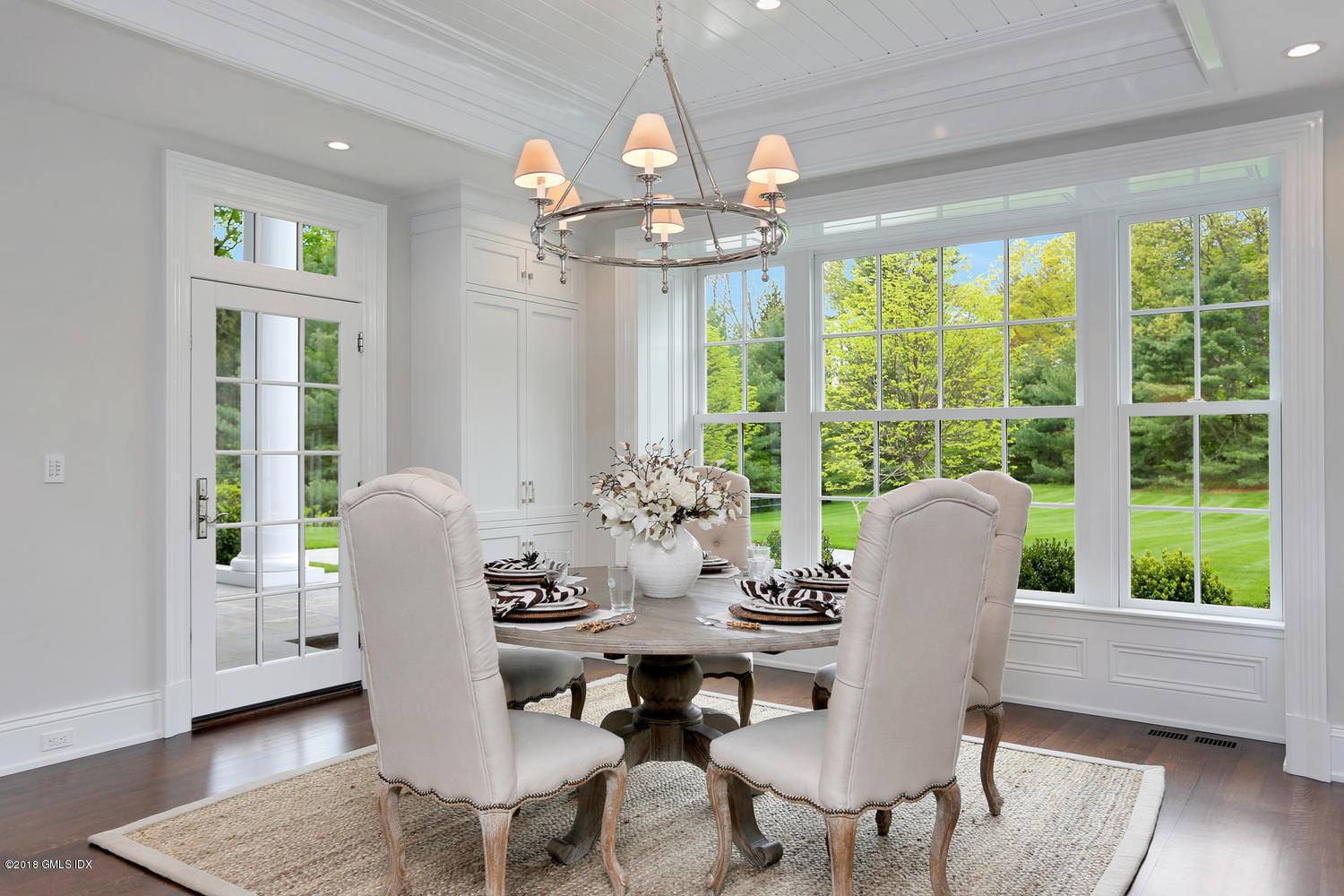 272 Round Hill Road Greenwich, CT 06831 - Photo 17 of 33 a view of a dining room with furniture window and wooden floor