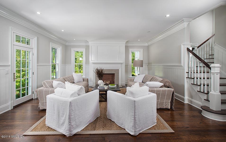 272 Round Hill Road Greenwich, CT 06831 - Photo 20 of 33 a living room with furniture and a fireplace