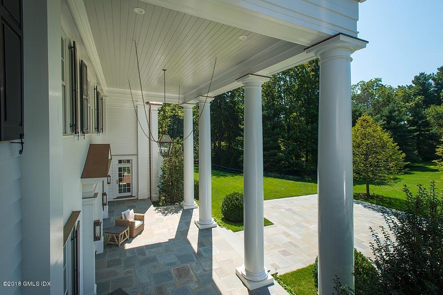 272 Round Hill Road Greenwich, CT 06831 - Photo 28 of 33 a view of a porch with plants and backyard