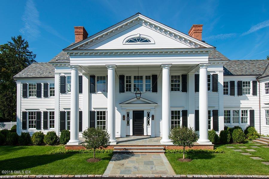 272 Round Hill Road Greenwich, CT 06831 - Photo 4 of 33 front view of a house with a yard