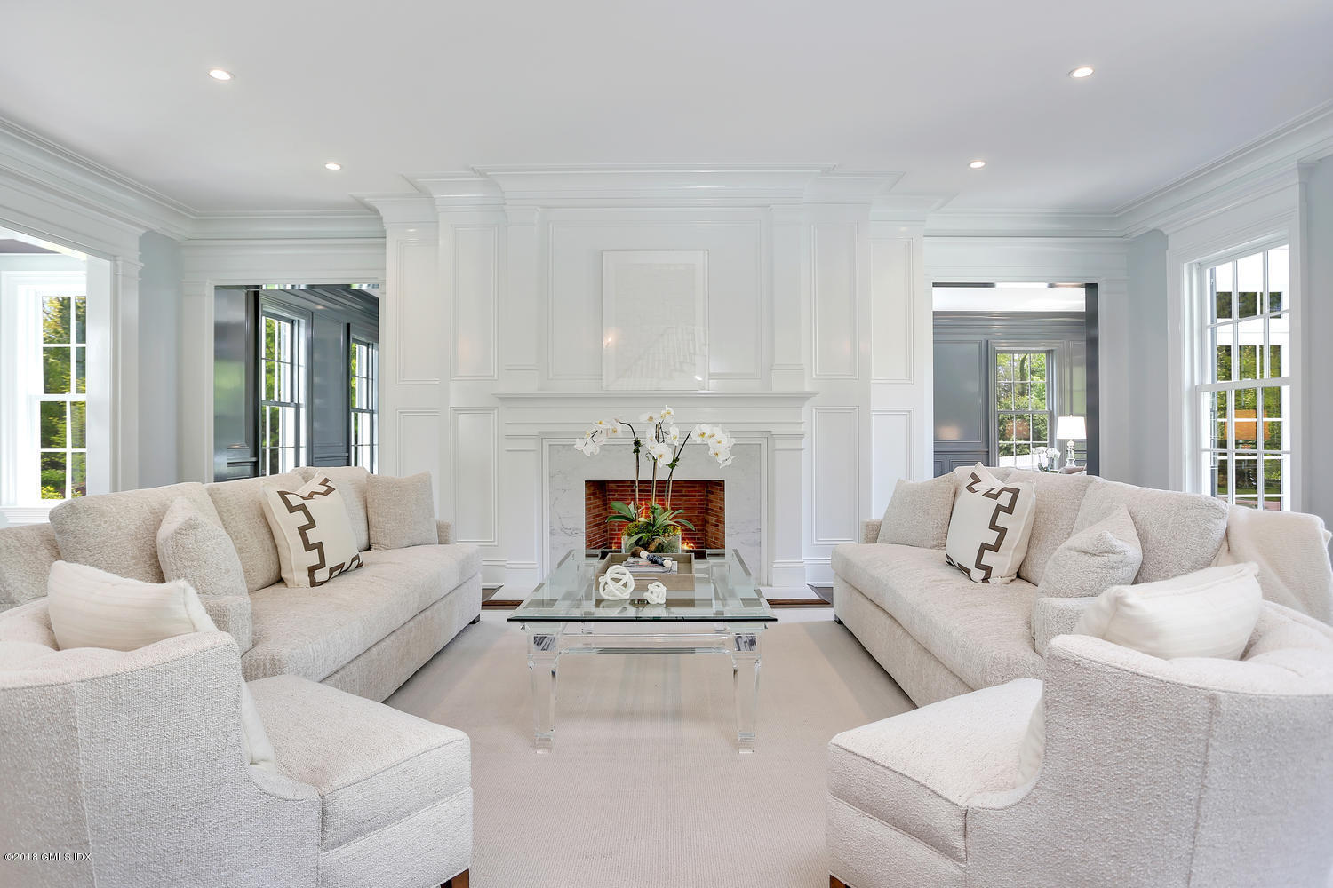 272 Round Hill Road Greenwich, CT 06831 - Photo 8 of 33 a living room with furniture and a fireplace