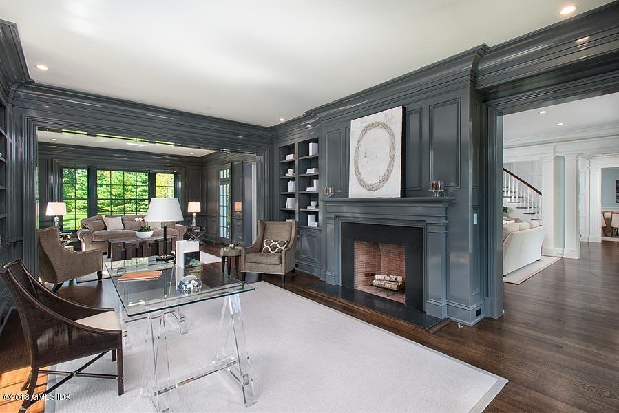 272 Round Hill Road Greenwich, CT 06831 - Photo 10 of 33 a living room with furniture and a fireplace
