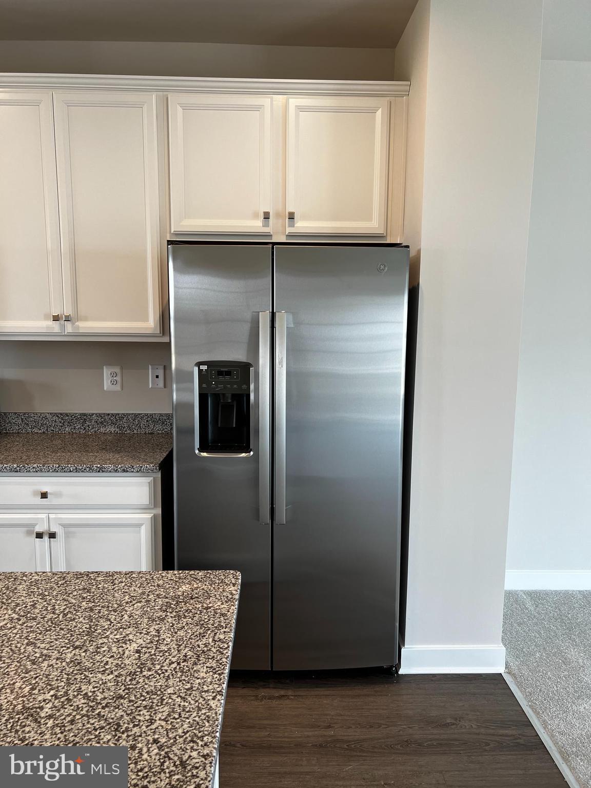 913 Ericcson Lane Middletown, DE 19709 - Photo 17 of 50 a kitchen with a refrigerator and cabinets
